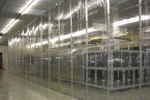 Wonclean real project photo of a transparent softwall cleanroom boundary with flexible curtain panels around a local clean zone