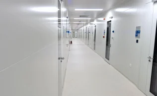 Controlling AMC and Static in Semiconductor Cleanroom Ceilings